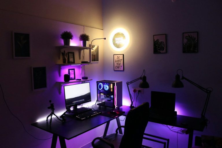 Black laptop computer on table streaming setup
