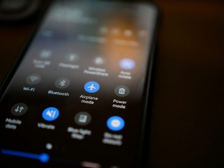 Black and white remote control i phone bluetooth