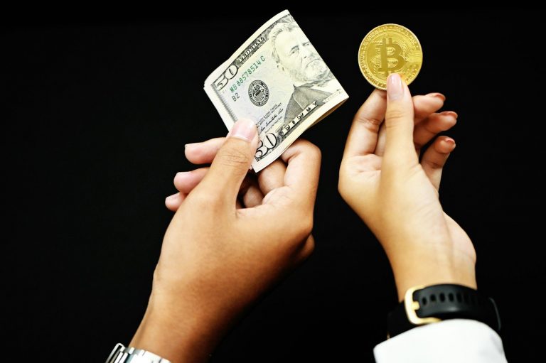 Person holding 20 us dollar bill crypto