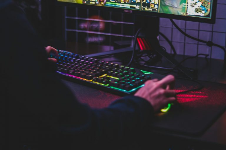 Person using desktop computer gaming