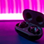 black game controller on red textile